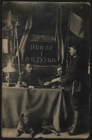 Polish Army] Posed photograph of soldiers of the Polish Army. In the background the White Eagle and the slogan 
