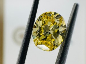0.8 NATURAL POLISHED FANCY VIVID YELLOW DIAMOND - GEMMOLOGICAL CERTIFICATE - SI1 - GIA - BM50101