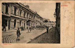 1905 Nyitra, Nitra; Telegdy utca, Spitzer József üzlete, masírozó katonák / street view, shops, marching K.u.K...