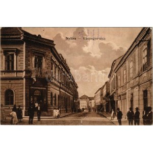 1917 Nyitra, Vármegye utca, gyógyszertár, üzlet, Singer varrógép reklám. Huszár István kiadása / street view, shop...