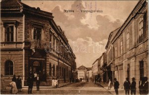 1917 Nyitra, Vármegye utca, gyógyszertár, üzlet, Singer varrógép reklám. Huszár István kiadása / street view, shop...