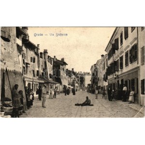 1910 Grado, Via Stefania / street view, shops (small tear)