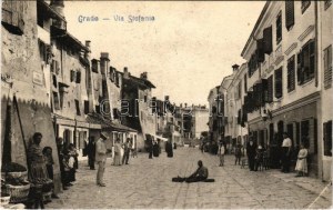 1910 Grado, Via Stefania / street view, shops (small tear)