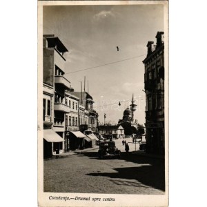 1935 Constanta, Konstanca; Drumul spre centru / street view, automobile, mosque, shops, beer hall (fl...