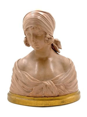 Bust of a young woman wearing a headscarf(Belgium, 20th century).