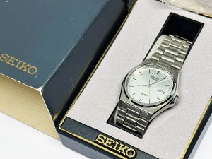 Seiko SQ100 35mm men's watch with original Seiko box