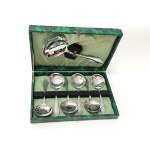 Set of chrome soup spoons in original case