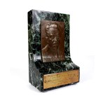 [PLASTER - on marble block]. Owned by St. Reymont.