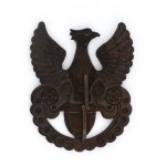 Eagle with wavy lower edge of amazon shield - letter L