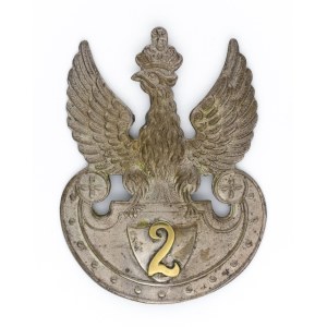 Orel podle návrhu Czesława Jarnuszkiewicze, číslo 2 na štítu - 2. ulánský pluk