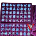 6 coin / medal pallets plus 64 coins in caps ! lots of mint