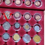 6 coin / medal pallets plus 64 coins in caps ! lots of mint