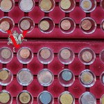 6 coin / medal pallets plus 64 coins in caps ! lots of mint