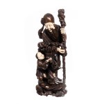 Signed wood carving with bone inlays, depicting Fukurokuju with child, 19th century