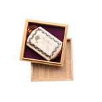 Inrō of bone with depiction of a lady, 19th century.