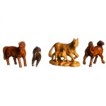 Four wooden netsuke depicting horses, early 20th century