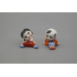 Pair of child figures, porcelain, 20th century.