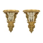 A pair of wall consoles