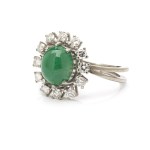 2nd half of the 20th century. Ring with emerald and diamonds