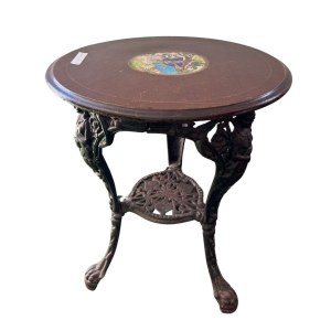 Round cast iron table with decorated wooden top
