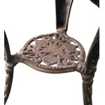 Round cast iron table with decorated wooden top