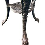 Round cast iron table with decorated wooden top