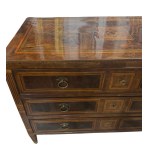 Elegant veneered and inlaid chest of drawers with geometric motifs