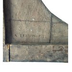 Carved wooden frame with religious figures