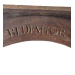 Carved wooden frame with religious figures