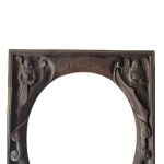 Carved wooden frame with religious figures