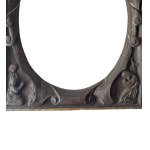 Carved wooden frame with religious figures