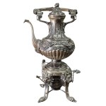Antique decorative samovar in silver-plated metal