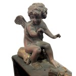 Pair of patinated bronze fireplace andirons depicting putti