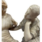 Two figures seated on a bench