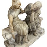 Due figure sedute su una panchina