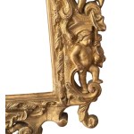 Carved and gilded wooden mirror