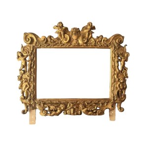 Carved and gilded wooden mirror