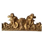 Carved and gilded wooden mirror