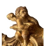 Carved and gilded wooden mirror