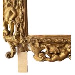Carved and gilded wooden mirror