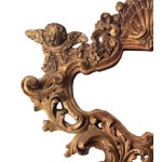 Gilded and carved wooden mirror