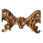 Gilded and carved wooden mirror