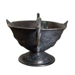 Hand-chiseled centerpiece vase in patinated bronze