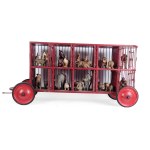 CIRCUS WAGONS WITH ANIMALS AND KEEPER