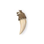 PENDANT IN THE SHAPE OF A TOOTH, LION