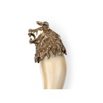 PENDANT IN THE SHAPE OF A TOOTH, LION