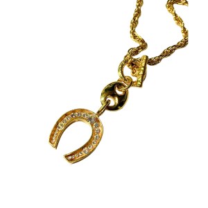Gold-plated vintage pendant in the form of a horseshoe