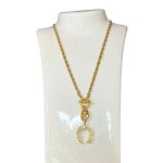 Gold-plated vintage pendant in the form of a horseshoe
