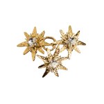 Gold-plated brooch in the form of stars with zircons