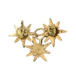 Gold-plated brooch in the form of stars with zircons